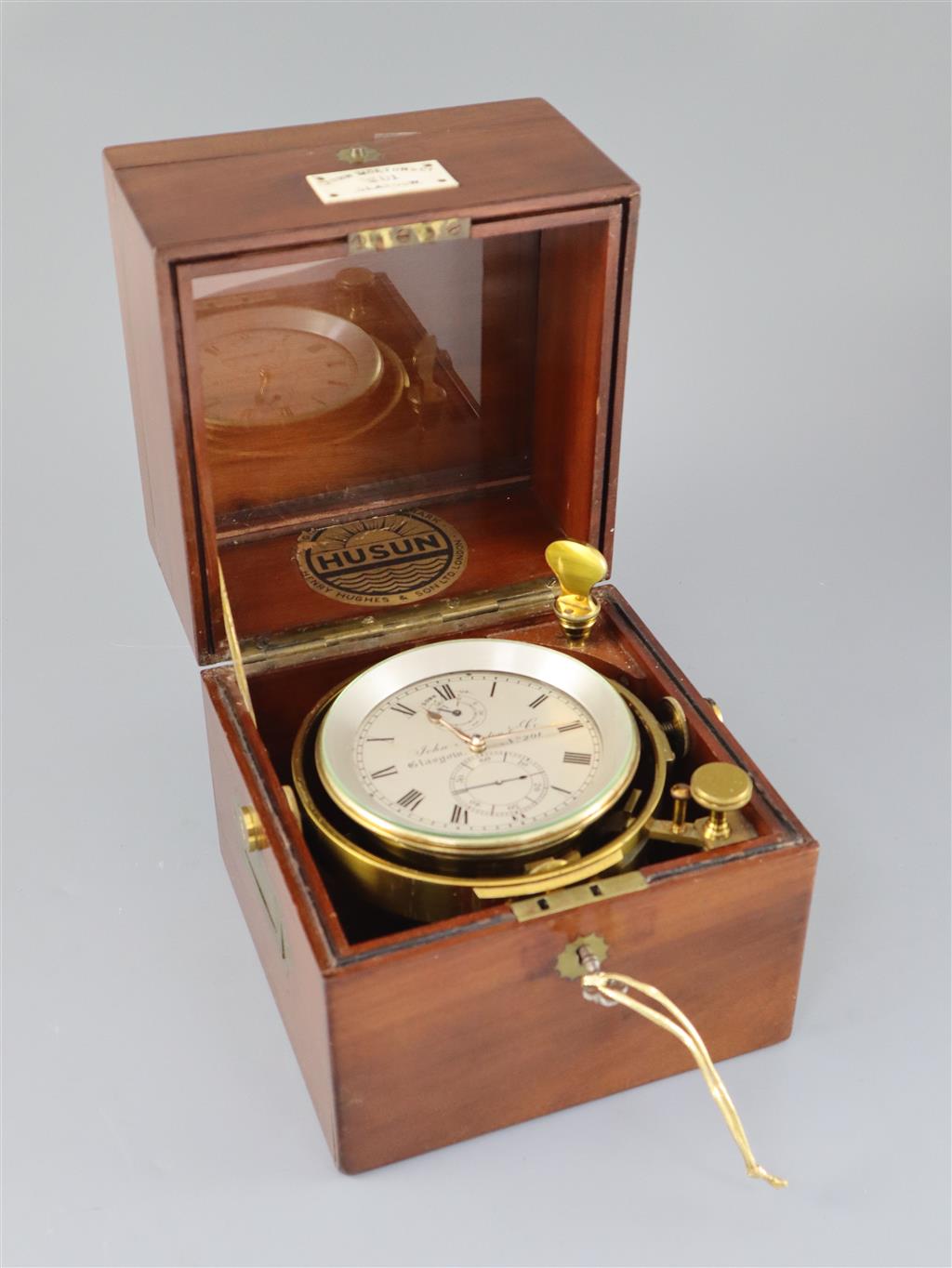 John Morton & Co. of Glasgow. A mahogany cased 2.5 day marine chronometer, case 7.25 x 7.25in. height 8in.